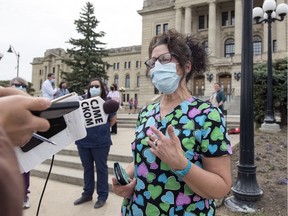 Colleen Denniss, continuing care assistant at Rose Villa in Rosetown, was among SEIU-West member leaders outside of the Legislative Building to share information about the struggles they face in Regina on Tuesday, June 16, 2020.