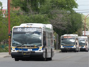 A public transit bus travels along 11th Avenue in Regina, Saskatchewan on June 10, 2020.