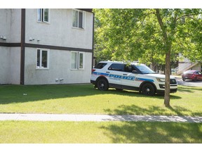 A police cruiser sits on Arens Road East in Regina, Saskatchewan on June 11, 2020. The location was the scene of a death investigation.