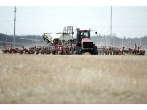 Farmers continue working in their fields during seeding time east of Regina on Tuesday, May 12, 2020. (Troy Fleece / Regina Leader-Post)