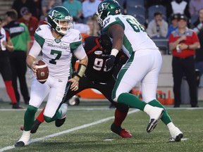 Saskatchewan Roughriders quarterback Cody Fajardo, 7, is shown June 20 against the host Ottawa Redblacks in his first CFL start.