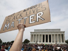 FILE: Demonstrators gather at the Lincoln Memorial during a protest against police brutality and racism on June 6, 2020 in Washington, DC.