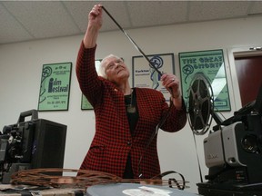 Ruth Shaw, one of the founders of the Yorkton Film Festival, looks over old 16mm film reels in 2005. Shaw's name lives on through the YFF's Best of Saskatchewan Ruth Shaw Award.