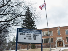 A sign at the Crescents School in Regina on March 25, 2020.