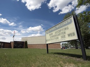 A sign out front Ethel Milliken school in Regina on Tuesday, June 9, 2020.