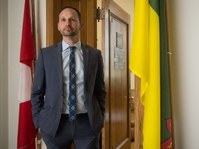 Saskatchewan NDP leader Ryan Meili stands in the doorway to his office in the Saskatchewan Legislative Building on June 11, 2020.