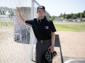 Kevin Mandzuk, a minor-league baseball umpire, poses for photos at the  Lions Park ball diamonds in Regina on July 2, 2020.