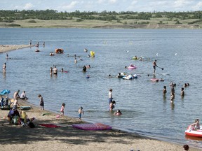 People enjoying the warm afternoon sun out at Regina Beach on Monday, July 6, 2020.
