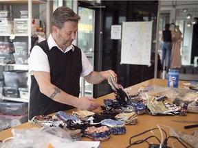 REGINA, SASK :  July 10, 2020  --  Dean Renwick, designer and owner of Dean Renwick Design Studio, sorts through face masks in his store in Regina on Friday, July 10, 2020.   TROY FLEECE / Regina Leader-Post