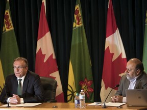 Health Minister Jim Reiter, left, and Saskatchewan chief medical officer Dr. Saqib Shahab provide a COVID-19 update at the Legislative Building in Regina on Monday, July 13, 2020.