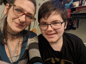 Regina Demyen, left, with her 20-year-old son Jaycee, who has Duchenne muscular dystrophy. Demyen has had to postpone a fundraiser meant to help her make her home wheelchair accessible until next spring due to COVID-19.