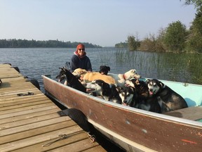 Miriam Körner and her dogs getting ready to go to the cabin in Northern Saskatchewan.