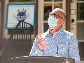 Joey Tremblay, co-chair of the board of directors for Street Culture Project, addresses a news conference in Regina on Wednesday.