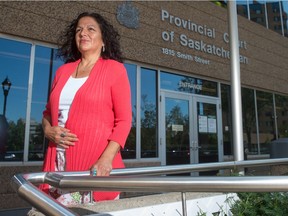 Court worker Tracy Desjarlais stands in front of the Provincial Court building in Regina, Saskatchewan on August 7, 2020. Desjarlais is passionate about providing a voice for those who have difficulty navigating the justice system and worked in policing before joining the Aboriginal Courtworker Program. BRANDON HARDER/ Regina Leader-Post