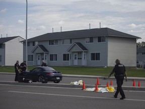 Regina police investigate a serious motor vehicle/ pedestrian collision in the area of Quinn Drive and Broad Street in Regina , Friday, August, 14, 2020.