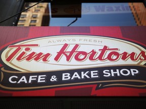 A sign hangs on a Tim Horton's cafe in Manhattan on August 25, 2014 in New York City.