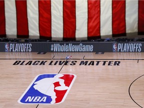 The NBA court in Lake Buena Vista, Fla., has been empty since Wednesday while players have boycotted games in support of Black Lives Matter.