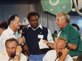 Johnny Esaw, left, George Reed, centre, and Ron Lancaster are shown during the Saskatchewan Roughriders' telethon on June 14, 1987. Roy Antal/Regina Leader-Post.