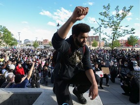 Black Lives Matter Saskatoon march organizer Braydon Page knelt down for a moment of silence in front of the Saskatoon Police Service headquarters along with thousands who came to rally together to honour George Floyd and stand up against social injustice.