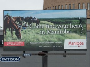 A billboard advertises travel to Manitoba on Albert Street in Regina on Sept. 2, 2020.