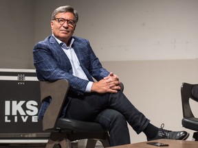 Costa Maragos sits on an in-construction set studio where his show In Real Time with Costa Maragos is to be produced at IKS Media and Technology in Regina, Saskatchewan on Sept. 3, 2020.