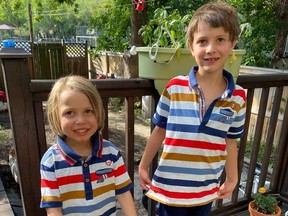 Marc Spooner's children Ansel, four, and Thomas, seven, wear the matching shirts they plan to wear on their first day of school. Ansel is starting pre-kindergarten and Thomas is starting Grade 2 at École Monseigneur de Laval in Regina.