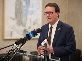 Regina mayor Michael Fougere speaks to media regarding the city's masking policy on transit busses during a news conference held at Regina City Hall in Regina, Saskatchewan on Sept. 30,