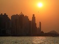 The harbour skyline is seen during sunset in Hong Kong.