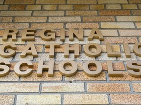 The sign on the front wall of Regina's Catholic school board office on Cameron Street.