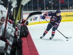 Carter Massier of the Regina Pats, shown last season against the Moose Jaw Warriors, is expected to play for the SJHL's Melville Millionaires until the Pats begin on-ice preparations for a WHL season that is to begin in January.