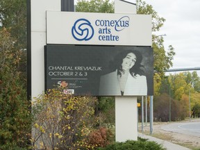 A sign advertising an upcoming concert at the Conexus Arts Centre appears on an electric sign outside the centre in Regina, Saskatchewan on Oct. 1, 2020.