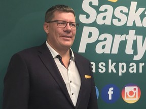 Saskatchewan Party Leader Scott Moe announced Sunday that Chris Guérette, right, would replace Daryl Cooper as the party's nominee for Saskatoon-Eastview. Cooper resigned Saturday after his history of sharing and promoting conspiracy theories online was brought to light.