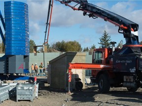 A crew works to pour concrete for a new clubhouse building at the Aspen Links Country Club in Emerald Park, Sask. on Oct. 15, 2020. A fire in September 2011 destroyed the previous clubhouse. BRANDON HARDER/ Regina Leader-Post