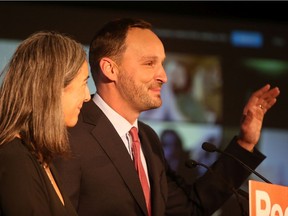NDP Leader Ryan Meili reacts to the news of another Sask. Party majority with his wife Mahli Brindamour at the Delta Hotels by Marriott in Saskatoon on Oct. 26, 2020.