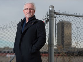 Regina mayoral candidate Jerry Flegel stands near the rail yard on Dewdney Avenue in Regina, Saskatchewan on Oct. 27, 2020.