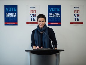 Regina mayoral candidate Sandra Masters, centre, speaks at a news conference at her campaign office on Prince of Wales Drive in Regina, Saskatchewan on Oct. 28, 2020.