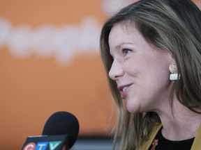 Newly elected NDP MLA Meara Conway arrives to a press conference at the Delta Hotel on Oct. 26, 2020.