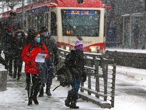 Passengers disembark at the City Hall CTrain station on Wednesday, October 21, 2020.