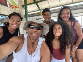 Former Saskatchewan Roughriders receiver Matt Dominguez (centre) and his family of Marcel (from left), Matthew, Victoria and wife Jennifer, shown here in warmer times, had to deal with a massive winter storm in Texas last week,