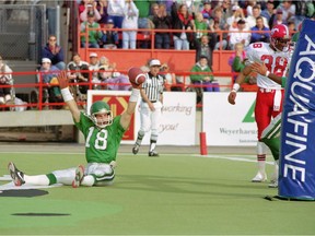 The Saskatchewan Roughriders' Jeff Fairholm celebrates a touchdown on Oct. 23, 1993 at Taylor Field, where the home team edged the Calgary Stampeders 48-45. The quarterbacks — Saskatchewan's Kent Austin and Calgary's Doug Flutie — combined for a CFL single-game record of 1,093 passing yards.