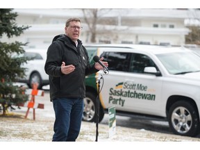 Saskatchewan Party leader and current Saskatchewan premier Scott Moe speaks to members of the media during a news conference held on Thornton Avenue in Regina, Saskatchewan on Oct. 21, 2020.