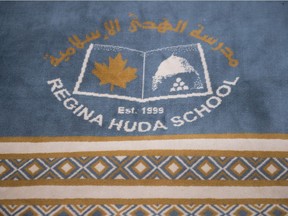 An example of the crest on a normal prayer rug used by students is pictured in the gymnasium at the Regina Huda School on Aug. 20, 2020. The rugs will not be used during the COVID-19 pandemic, and have instead been replaced by disposable butcher paper, which will be placed in classrooms for prayer.