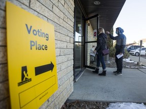 Community members enter a polling station in Saskatoon’s Silverspring neighbourhood to vote in the Saskatchewan election in Saskatoon.