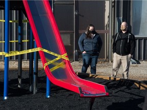 Larissa Goulet, left, speaks to Matt Jacobs playground, which was the site of a fire at Dr. L M Hanna School in Regina, Saskatchewan on Nov. 3, 2020. Goulet is a member of the school's school community council and Jacobs is a parent of children who attend the school. Jacobs has also helped to start a GoFundMe effort following the fire.

BRANDON HARDER/ Regina Leader-Post