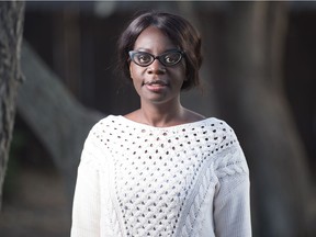 Author Alix Lwanga stands in a park near her home in Regina, Sask. on Nov. 4, 2020.