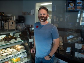 Ken MacMurchy, owner of Brewed Awakening, stands in the coffee shop chain's location on Woodhams Drive in Regina on Nov. 5, 2020.