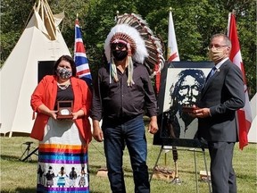 A ceremony on Aug. 28, 2020 saw treaty medals restored to the Beardy's & Okemasis First Nation. Mary Culbertson, the Treaty Commissioner of Saskatchewan (left), Chief Edwin Ananas, Beardy's & Okemasis First Nation, and Saskatchewan Lt.-Gov. Russ Mirasty. (Photo courtesy Angela Merasty, office of the Treaty Commissioner.)