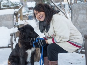 Carol Rose GoldenEagle sits with her dog Saffy at her home in Regina Beach  on Nov 13, 2020.