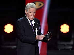 FILE: "Jeopardy!" host Alex Trebek presents the Hart Memorial Trophy during the 2019 NHL Awards at the Mandalay Bay Events Center on June 19, 2019 in Las Vegas, Nevada.