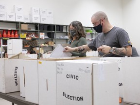 Elections Regina workers process mail-in ballots at a sorting facility for the 2020 municipal election. MICHAEL BELL / Regina Leader-Post